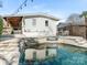 Relaxing pool area, with patio and outdoor kitchen at 1408 Edgewater Dr, Charlotte, NC 28210