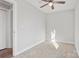 Spacious bedroom with carpeted floor and ceiling fan at 1443 Southwest Blvd, Newton, NC 28658