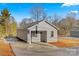 Newly constructed gray house with a concrete driveway at 1443 Southwest Blvd, Newton, NC 28658