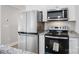 Stainless steel appliances and granite countertops in the kitchen at 1443 Southwest Blvd, Newton, NC 28658