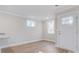 Living room with hardwood floors and white front door at 1443 Southwest Blvd, Newton, NC 28658