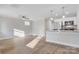 Open living room with hardwood floors and a ceiling fan at 1443 Southwest Blvd, Newton, NC 28658