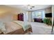 Bedroom with bay window, dresser, and king bed at 14818 Long Iron Dr, Huntersville, NC 28078