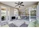 Covered screened porch offers outdoor living space with seating at 14818 Long Iron Dr, Huntersville, NC 28078