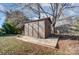 Wooden storage shed with a raised wooden deck at 14818 Long Iron Dr, Huntersville, NC 28078