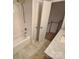 Updated bathroom with tiled floors and a bathtub at 1601 Lyndale Pl, Charlotte, NC 28210