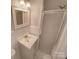 Simple bathroom with shower and vanity at 1601 Lyndale Pl, Charlotte, NC 28210