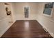 Dining room with hardwood floors and access to deck at 1601 Lyndale Pl, Charlotte, NC 28210