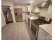 Modern kitchen with stainless steel appliances at 1601 Lyndale Pl, Charlotte, NC 28210