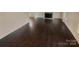 Dark hardwood floors in spacious living room at 1601 Lyndale Pl, Charlotte, NC 28210