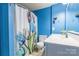 Clean bathroom with white vanity and blue walls at 182 Water Oak Dr, Pineville, NC 28134