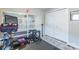 Home gym with Peloton bike and weight equipment at 182 Water Oak Dr, Pineville, NC 28134