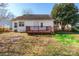 View of home's rear and deck from the yard at 210 Lauren Dr, Indian Trail, NC 28079