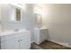 Bathroom with double vanity and white cabinets at 210 Lauren Dr, Indian Trail, NC 28079