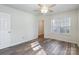 Bedroom featuring wood-look floors and a ceiling fan at 210 Lauren Dr, Indian Trail, NC 28079