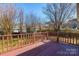 Wooden deck overlooking a fenced backyard at 210 Lauren Dr, Indian Trail, NC 28079