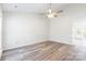 Bright living room with laminate floors and a ceiling fan at 210 Lauren Dr, Indian Trail, NC 28079