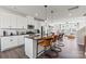 Modern kitchen with island, stainless steel appliances, and dark countertops at 2306 Donnelly Hills Ln, Charlotte, NC 28262