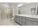 Modern bathroom with double vanity and a large shower at 2314 Donnelly Hills Ln, Charlotte, NC 28262