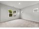 Bright bedroom with carpet and multiple windows at 2314 Donnelly Hills Ln, Charlotte, NC 28262