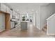 Modern kitchen with gray cabinets and a large island at 2314 Donnelly Hills Ln, Charlotte, NC 28262