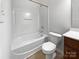 Clean bathroom with a tub, toilet and vanity at 2653 Early Flight Dr, Charlotte, NC 28262