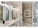 Elegant bathroom with double vanity and large shower at 277 Melrose Sw Dr, Concord, NC 28025