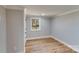 Bright bedroom with hardwood floors and neutral walls at 277 Melrose Sw Dr, Concord, NC 28025