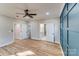 Large bedroom with hardwood floors and ceiling fan at 277 Melrose Sw Dr, Concord, NC 28025