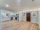 Modern white kitchen with stainless steel appliances and ample cabinet space at 277 Melrose Sw Dr, Concord, NC 28025