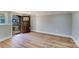 Bright living area with hardwood floors and access to a back deck at 277 Melrose Sw Dr, Concord, NC 28025