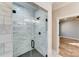 Modern shower with marble tile and glass enclosure at 277 Melrose Sw Dr, Concord, NC 28025