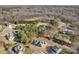 Aerial view of a house and surrounding neighborhood with lush greenery at 305 Goldfinch Ct, Shelby, NC 28150