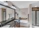 Double vanity bathroom with soaking tub at 305 Goldfinch Ct, Shelby, NC 28150