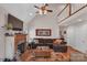 Living room boasts a high ceiling, fireplace, and ample natural light at 305 Goldfinch Ct, Shelby, NC 28150