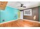 Bedroom showcasing hardwood floors and natural light at 3050 Wilkesboro Hwy, Statesville, NC 28625