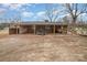 Large brick carport suitable for multiple vehicles and storage offering protection from the elements at 3050 Wilkesboro Hwy, Statesville, NC 28625