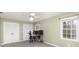 Bright bedroom has carpeting, a ceiling fan, double closets, and a desk area at 330 Regency Rd, Salisbury, NC 28147