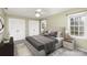 Serene bedroom with plush bedding, neutral tones, and bright natural light at 330 Regency Rd, Salisbury, NC 28147