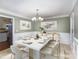 Elegant dining room with modern chandelier and ample seating at 330 Regency Rd, Salisbury, NC 28147