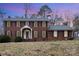 Brick house with a two-car garage and well-maintained lawn at 330 Regency Rd, Salisbury, NC 28147