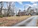 Brick house with long driveway and mature trees at 330 Regency Rd, Salisbury, NC 28147