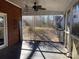 Cozy screened porch with wood floors and ceiling fan at 330 Regency Rd, Salisbury, NC 28147