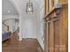 Bright and airy entryway with hardwood floors and a view into the living room at 3319 Holt St, Charlotte, NC 28205