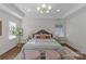 Bright main bedroom with a king-size bed and stylish decor at 3319 Holt St, Charlotte, NC 28205