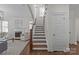 Elegant staircase with wooden railings and hardwood floors at 3319 Holt St, Charlotte, NC 28205