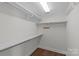 Large walk-in closet with ample shelving and hanging space at 3319 Holt St, Charlotte, NC 28205