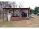 Covered patio with seating area and grill at 334 Stanley Spencer Mtn Rd, Gastonia, NC 28056