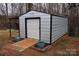 Metal storage shed with ramp and landscaping at 334 Stanley Spencer Mtn Rd, Gastonia, NC 28056