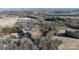 An aerial shot highlighting the property's layout with trees, fields, and the location of the home at 3374 Skyline Rd, Rock Hill, SC 20730